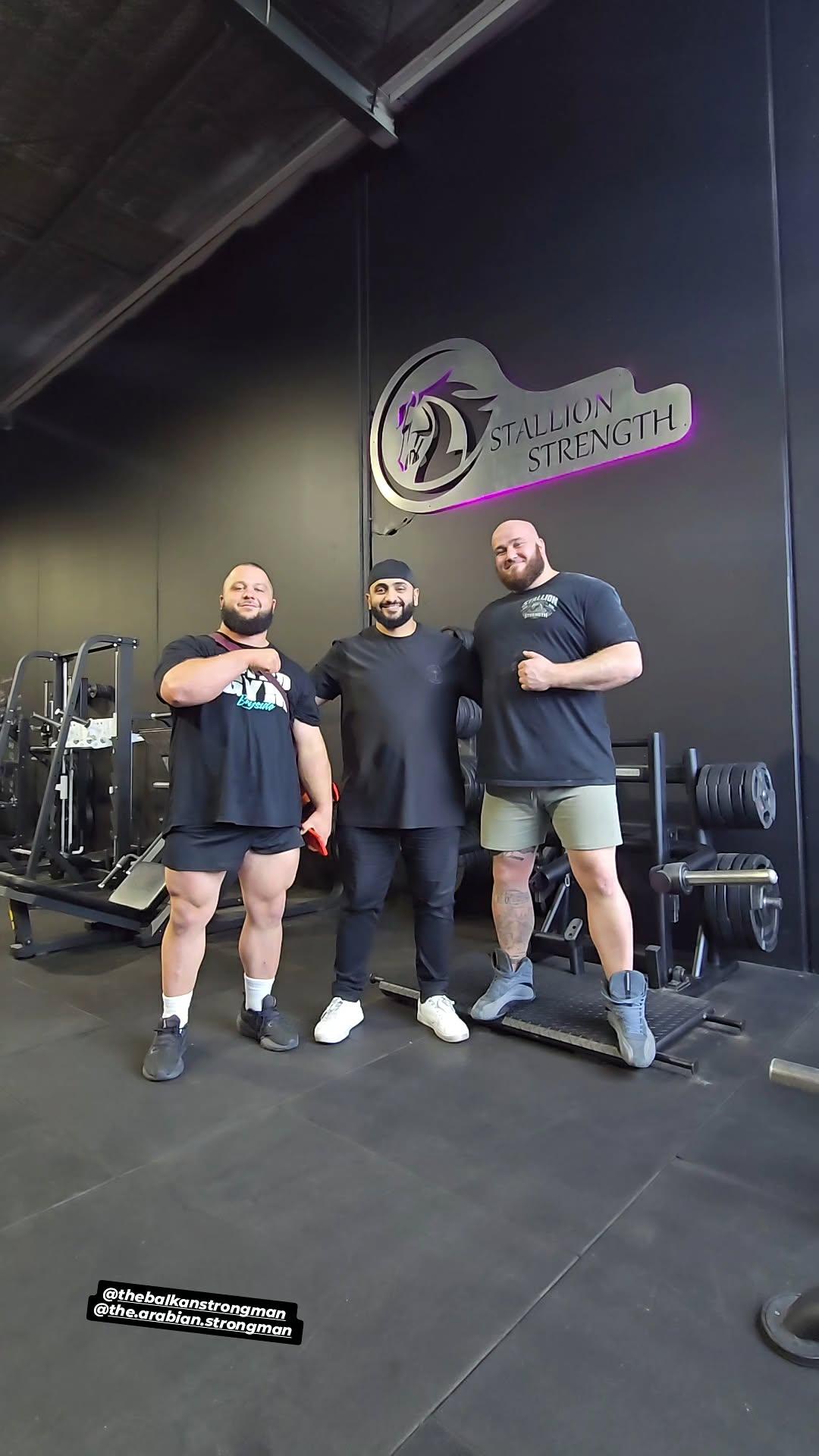 Ben with strongman athletes at Stallion Strength